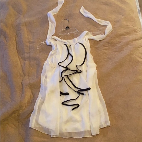 Sleeveless ruffle blouse - Picture 1 of 1